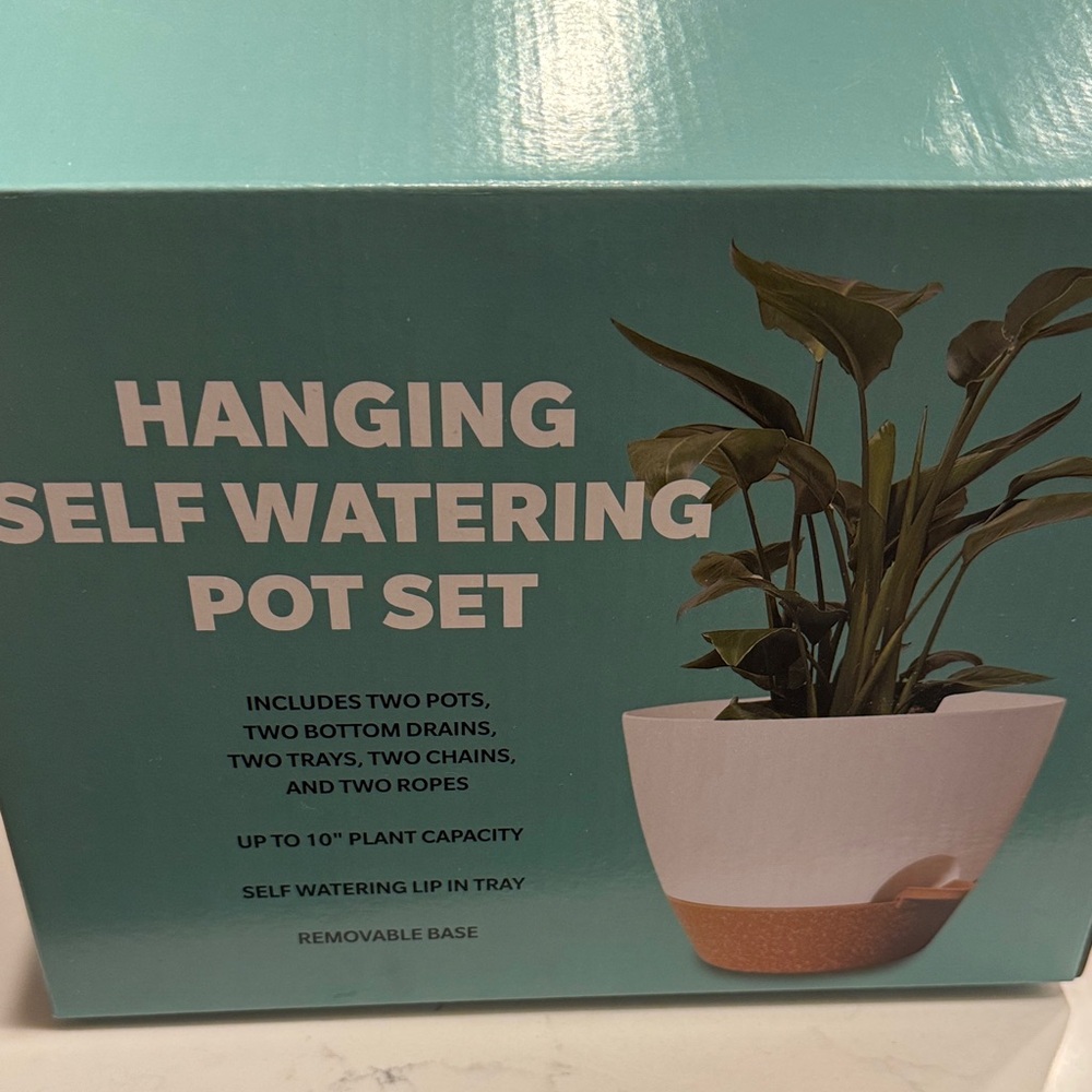 Hanging self watering pot set-2
2 pots, bottom drains, trays, chains, and ropes